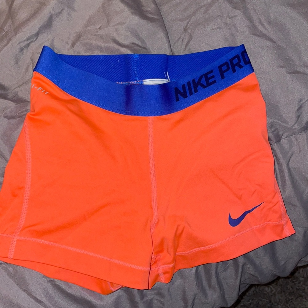 Coral Nike Pros
